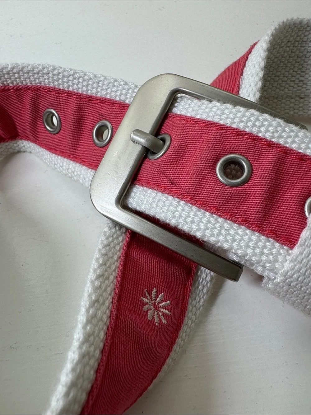 Unbranded coal and white ribboned web belt with silver tone buckle.